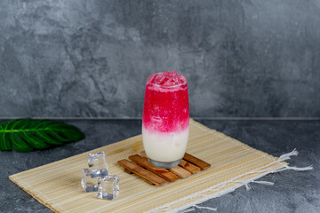 Red milk soda is a colorful, sweet, and creamy drink combining red syrup, milk, and soda over ice for a vibrant, fizzy refreshment. Popular at parties and loved for its unique flavor and presentation.