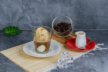 Affogato coffee is a classic Italian dessert featuring a scoop of vanilla ice cream or gelato “drowned” with hot espresso. This indulgent treat offers a perfect blend of bitter and sweet, hot and cold