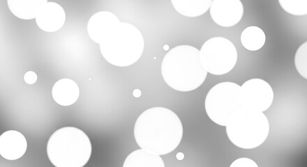 Abstract gray background with soft bokeh circles and white highlights