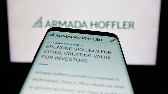 Stuttgart, Germany - 11-08-2025: Mobile phone with website of US company Armada Hoffler Properties Inc. on screen in front of logo. Focus on top-left of phone display.