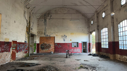 Exploring a forgotten industrial ruin a powerful image of architectural decay structural deterioration vast empty interior
