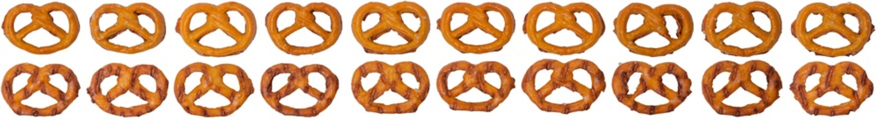 Isolated collection of different frontside and backside pretzels on a white background