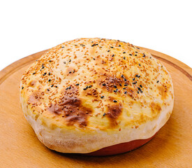 Homemade bread with sesame and poppy seeds baked on wooden board