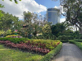 Obraz premium Ho Chi Minh City Zoo and Botanical Gardens (Thảo Cầm Viên Sài Gòn): Tropical Greenery and Leisure Area. 