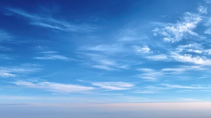 Gentle gradient blue sky with wispy clouds for calm, versatile backdrops