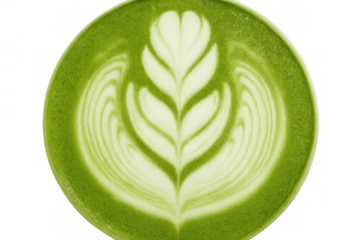 Matcha green tea latte with foam art, creating a rosetta leaf design, healthy vegan drink preparation