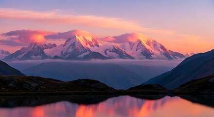 Majestic Snow-Capped Mountains Reflecting in a Serene Lake at Sunrise.