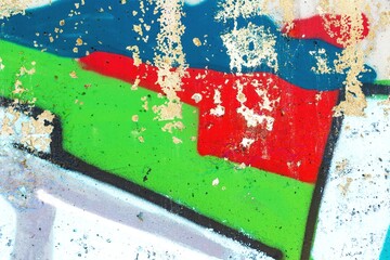 Abstract graffiti in vibrant red, green, blue with textured layers, street art style. Bright colors, urban textures, modern 90s, contemporary design. Banners, digital art, creative backgrounds.