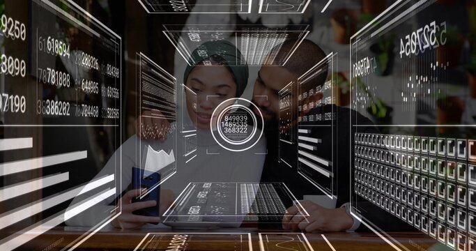 Leaning woman green headscarf, man dark shirt studying smartphone and laptop at cafe, AR overlay