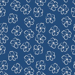 Seamless floral pattern with white flowers on blue background