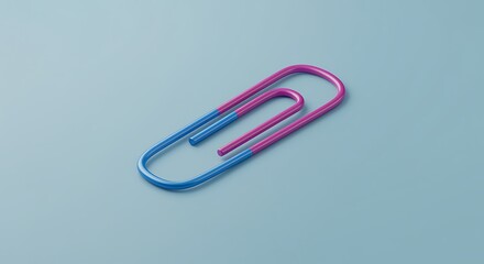 Vibrant Two Toned Paper Clip on Light Blue Background Creates a Modern and Minimalist Aesthetic Great for Office or Design Concepts