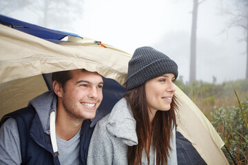 Forest, camping or happy couple with tent for vacation, view nature or travel adventure in winter. Outdoor holiday, love or people together for bonding, connection or environment for relationship