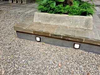 Garden path with gravel and stones, neat greenery and clean layout creating a comfortable walkway