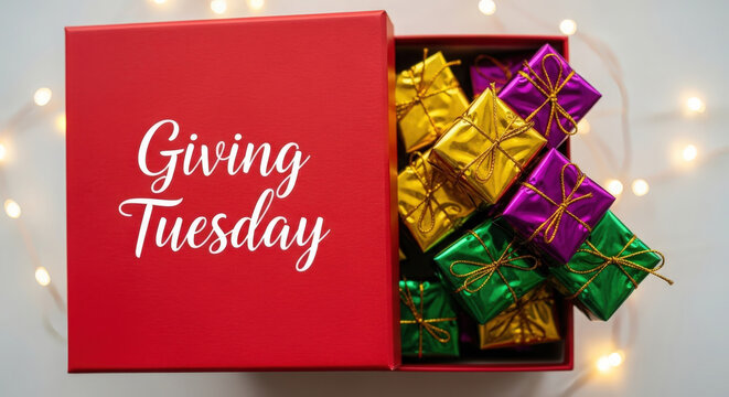 Red gift box filled with colorful wrapped chocolates for giving tuesday celebration - Powered by Adobe