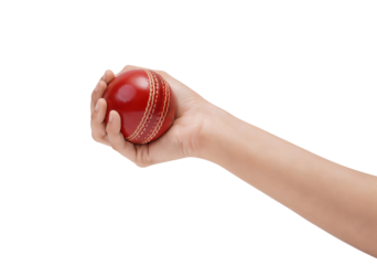 Hand gripping a red cricket ball, ready for game play or practice.