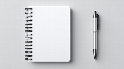 Notebook and Pen on a Gray Background