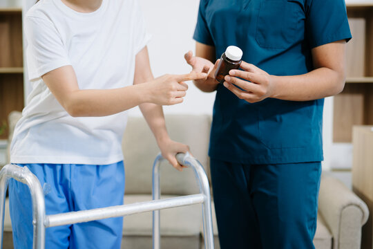 Healthcare professional assisting a patient in physiotherapy rehab using a walker, symbolizing recovery, mobility support, - Powered by Adobe