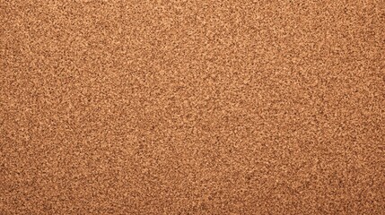 Fototapeta premium Close-up of a textured corkboard surface.
