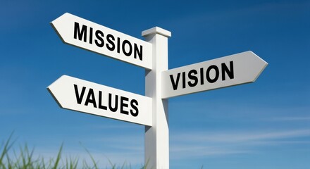 Guiding signpost outlines core Mission, Vision, and Values, providing clear strategic business direction against a bright blue sky, inspiring future organizational success