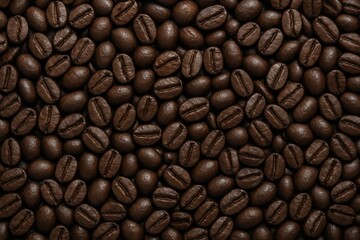 Obraz premium Close-up view of roasted coffee beans scattered in seamless pattern on dark background, highlighting food texture and caffeine concept theme. Ai generative