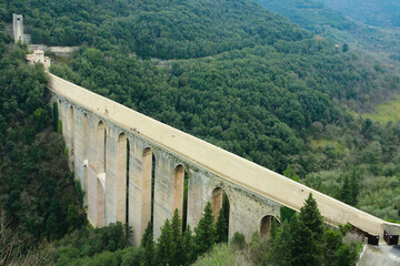 Obraz premium Aerial view of the ancient Bridge of Towers (Italian: Ponte delle Torri) in Spoleto, Umbria Region, Italy