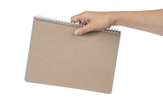 Blank book cover in hand on transparent background.