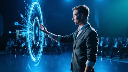 Man presents holographic interface to audience at technology conference. Speaker touches futuristic display. Businessman demonstrates holographic tech. Man with interface presenting to audience.