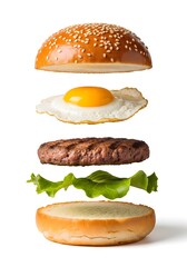 Flying burger with egg, beef patty, lettuce, and sesame bun isolated on white background, deconstructed hamburger ingredients in mid-air