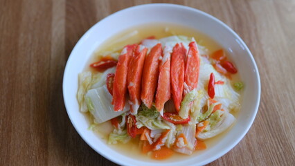 Table top view napa cabbage with crab stick isolate on white plate