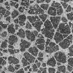 The texture of the asphalt surface on the highway