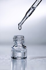 Droplet of Liquid Falling into Glass Bottle, Scientific Precision, Minimalist Aesthetic.