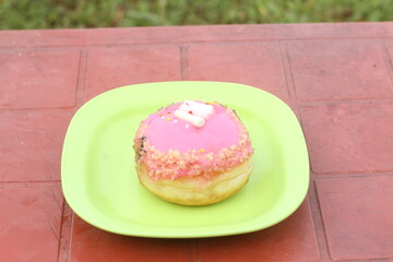 donut with pink icing