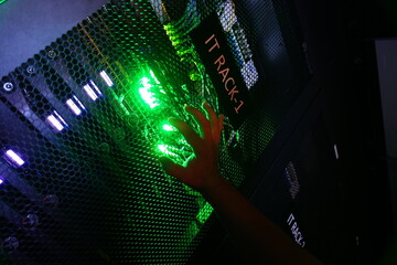 Illuminated IT Rack with Glowing Hand