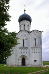 Church of the Intercession on the Nerl from 12th century in Bogolyubovo, Vladimir oblast of Russia. Cloudy summer view.
