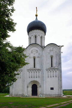 Church of the Intercession on the Nerl from 12th century in Bogolyubovo, Vladimir oblast of Russia. Cloudy summer view.