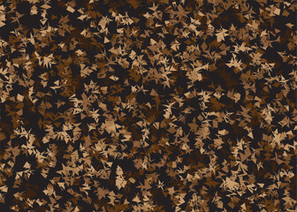 Close up overhead view of a dense carpet of fallen autumn leaves in various shades of brown and gold