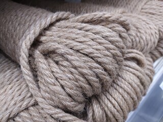 Skein of brown rope as a background, closeup of photo