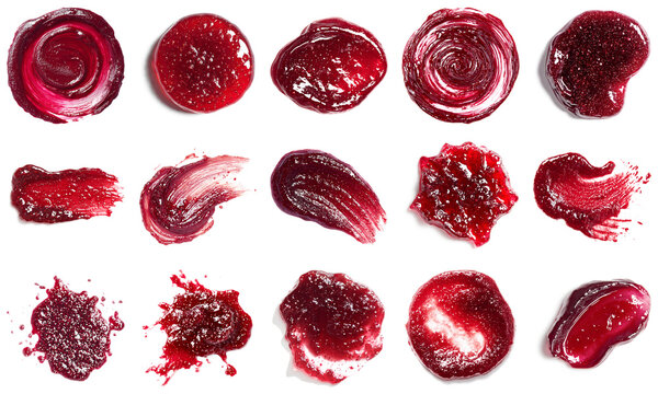 Discover an array of raspberry jam spreads isolated on a white background. This vibrant collection showcases delightful textures perfect for garnishing various dishes.