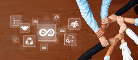 A diverse group of hands shows unity and collaboration around digital icons that represent sustainability, innovation, and eco-friendly business practices. Trope