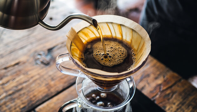 Barista Pouring Hot Water into a V60 Pour Over Coffee Maker