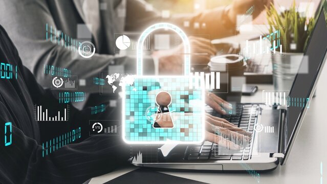 Conceptual image showcasing digital security with a lock symbol on a laptop, emphasizing data protection and privacy in a modern office environment. Xenic