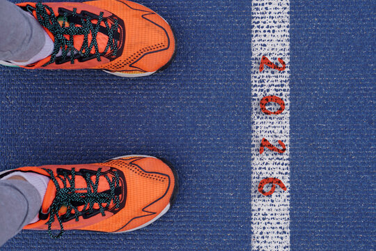 2026 New Year. The beginning of the year represented by the number 2026 at the starting line