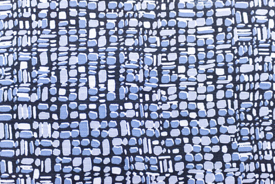A seamless blue geometric shape print on textile fabric. Texture, background.