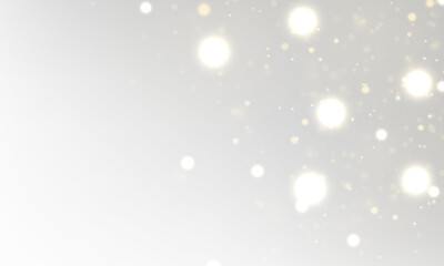 White sparks and stars glitter with soft golden glow on a transparent background. Magical sparkling dust particles create an elegant festive design for Christmas and winter holidays.