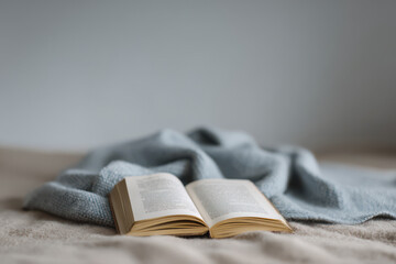 open notebook resting on soft cozy blanket creates inviting atmosphere perfect for creativity