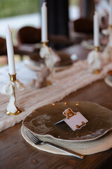Elegant dinner setting with charming decorations and cozy atmosphere for a special occasion