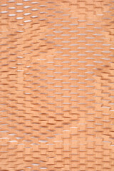 A close-up shot shows the texture of brown packing paper cut into an expandable honeycomb pattern for cushioning