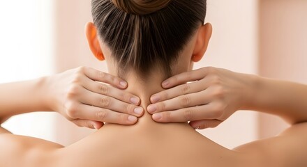 Woman massage her painful neck due to muscle tension or injury, providing relief for discomfort and stress. Concept of self care and wellness.