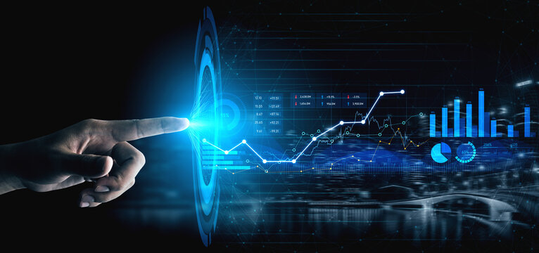 A close-up view of a hand reaching towards a glowing digital interface, showcasing dynamic data analytics graphs and charts that symbolize technological advancement in business. Scalp