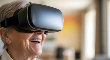 An older woman is wearing a virtual reality headset and smiling.